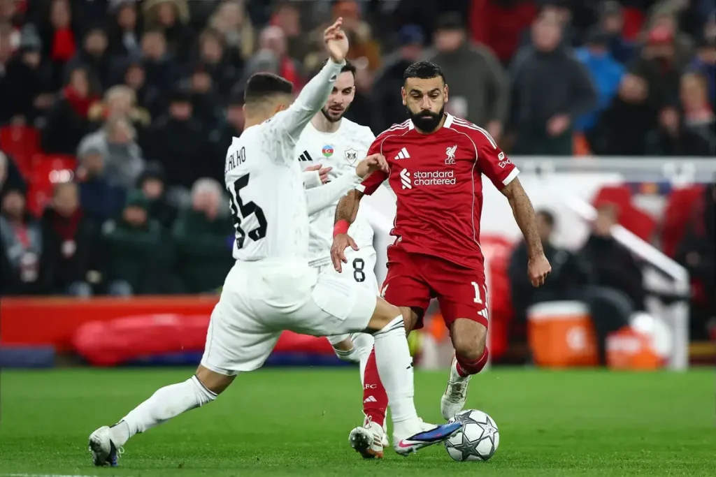 “Salah shines and Liverpool thrashes Qarabag to advance to the round of 16.”