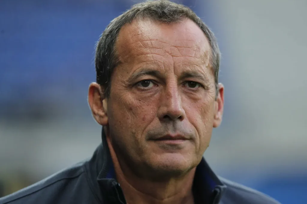 Former president of a French club is murdered during his mother’s funeral.