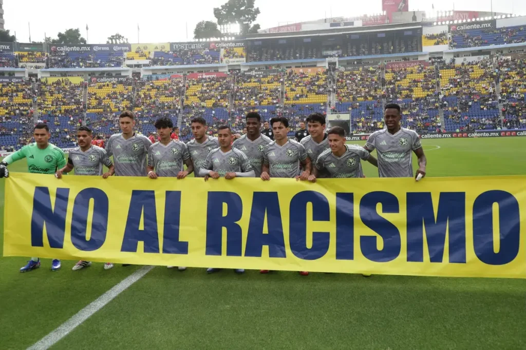 Football players face racism and demand immediate action from the authorities.