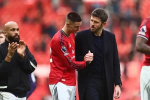 Michael Carrick reacts after Manchester United’s victory over Crystal Palace with 10 players.