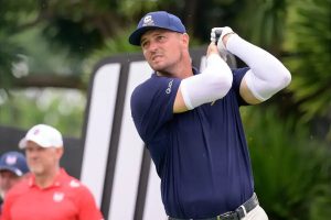 Bryson DeChambeau impresses by hitting 393 yards.