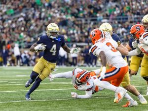 John Harbaugh praises Jeremiyah Love in draft rumors.
