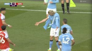 “Haaland takes off his jersey and throws it into the stands during a heated match.”