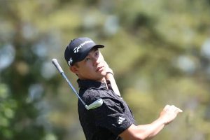 Collin Morikawa shines at the Masters despite back injury.