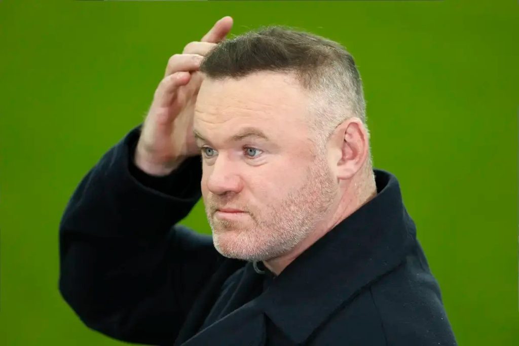 Wayne Rooney defends Michael Carrick as the next manager of Man Utd.