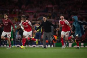 “Arsenal one step away from the Premier League title after surprising results.”
