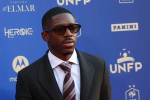 “Dembele wins Ligue 1 Player of the Year award in controversy.”