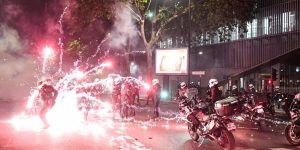 PSG celebrations in Paris end in chaos with 127 detained.