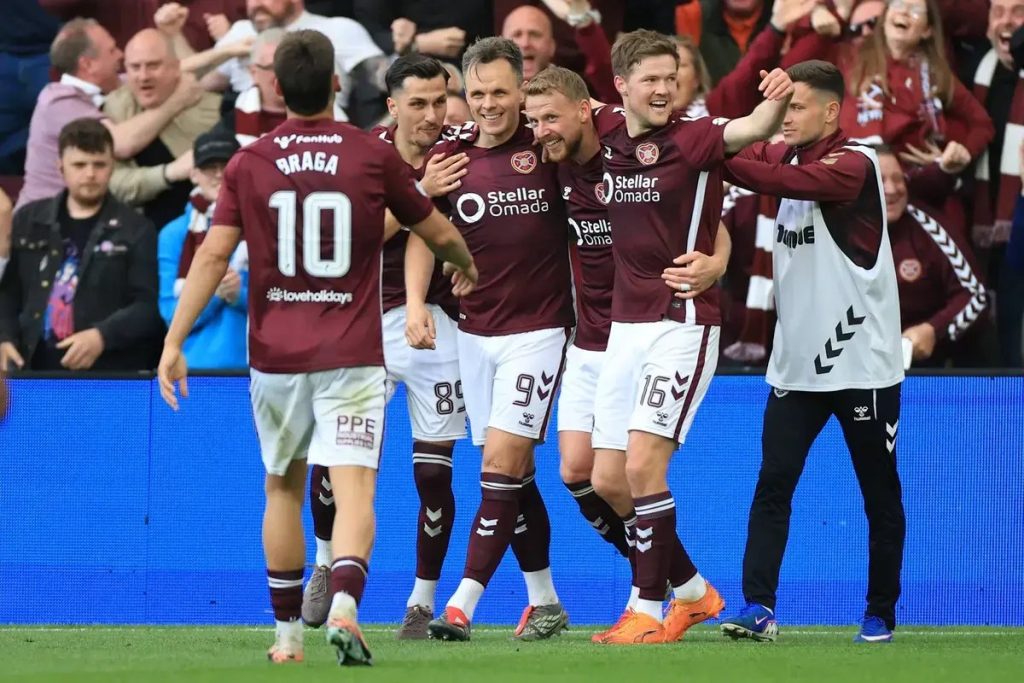 “Hearts are back in action and lead the race for the Scottish title.”