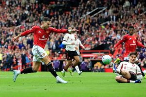 “Manchester United defeats Liverpool in an exciting classic.”