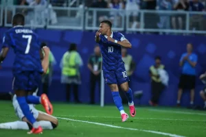 “Mbappé matches Klose with two goals in France’s victory over Iraq.”