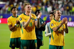 Australia secures a spot in the World Cup round of 16 after drawing with Paraguay.
