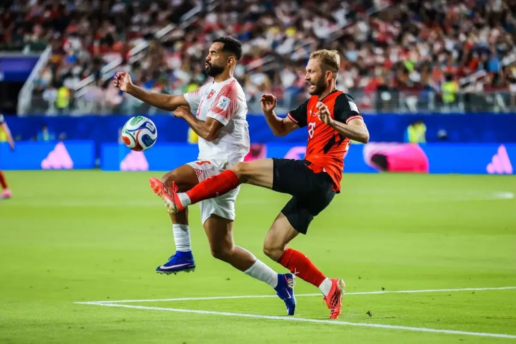 Austria defeats Jordan 3-1 and ties with Argentina in Group J of the World Cup.
