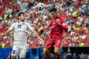 Cristiano Ronaldo makes history with two goals in Portugal’s rout of Uzbekistan.