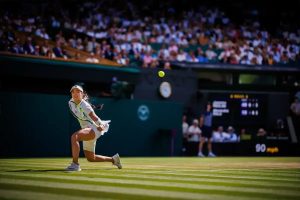 Alexandra Eala makes history at Wimbledon but falls to Jasmine Paolini.