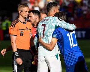 “Ronaldo comforts Modric after eliminating Croatia from the World Cup with a decisive goal.”