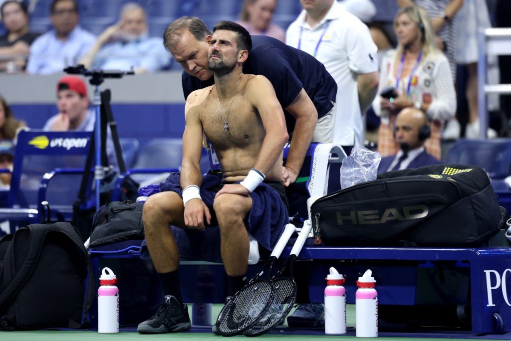 Novak Djokovic suffers shock us open first-round defeat after vomiting on court