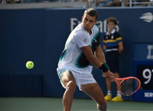Flavio Cobolli rallies from a set down to beat Schoolkate in four sets at US Open