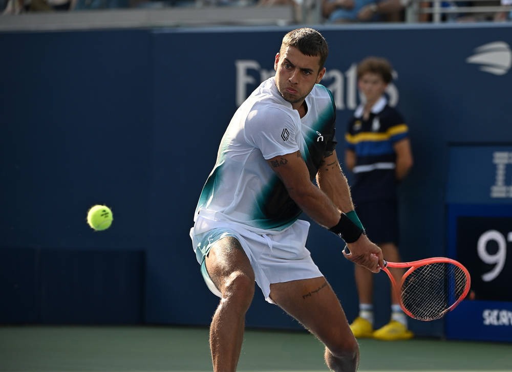 Flavio Cobolli rallies from a set down to beat Schoolkate in four sets at US Open