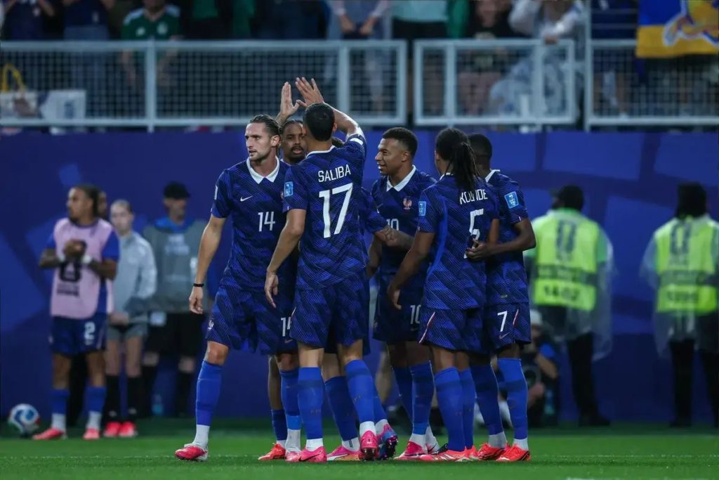 Kylian Mbappe praises France’s resilience after grueling storm-delayed win over Iraq