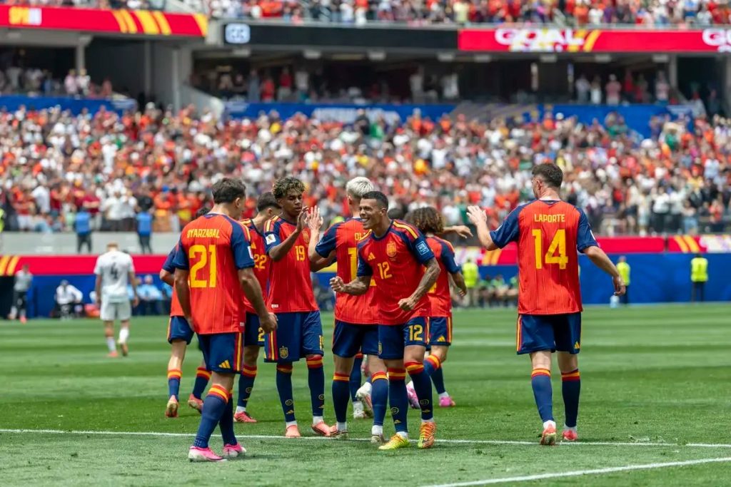 Spain dominates Austria with a flawless 3-0 win to reach world cup round of 16